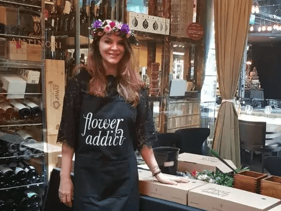 Sandi running a Flower Crown workshop in a Flower Addict apron