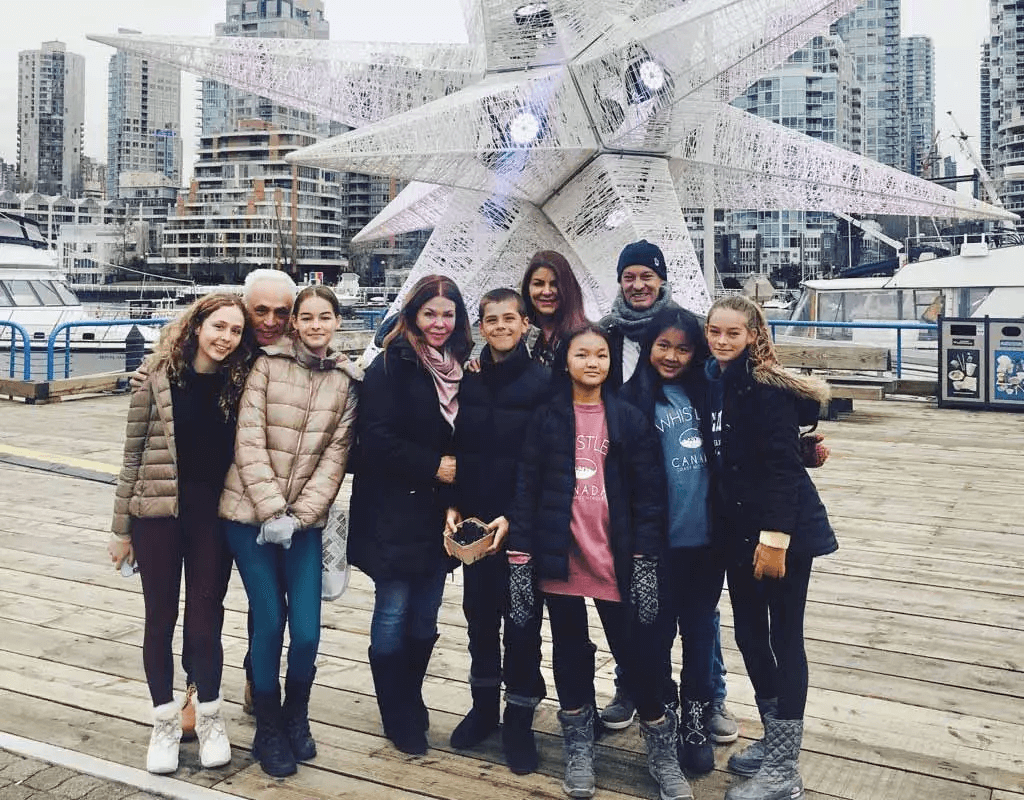 Kerry and Sandi on holiday with their families before Covid-19